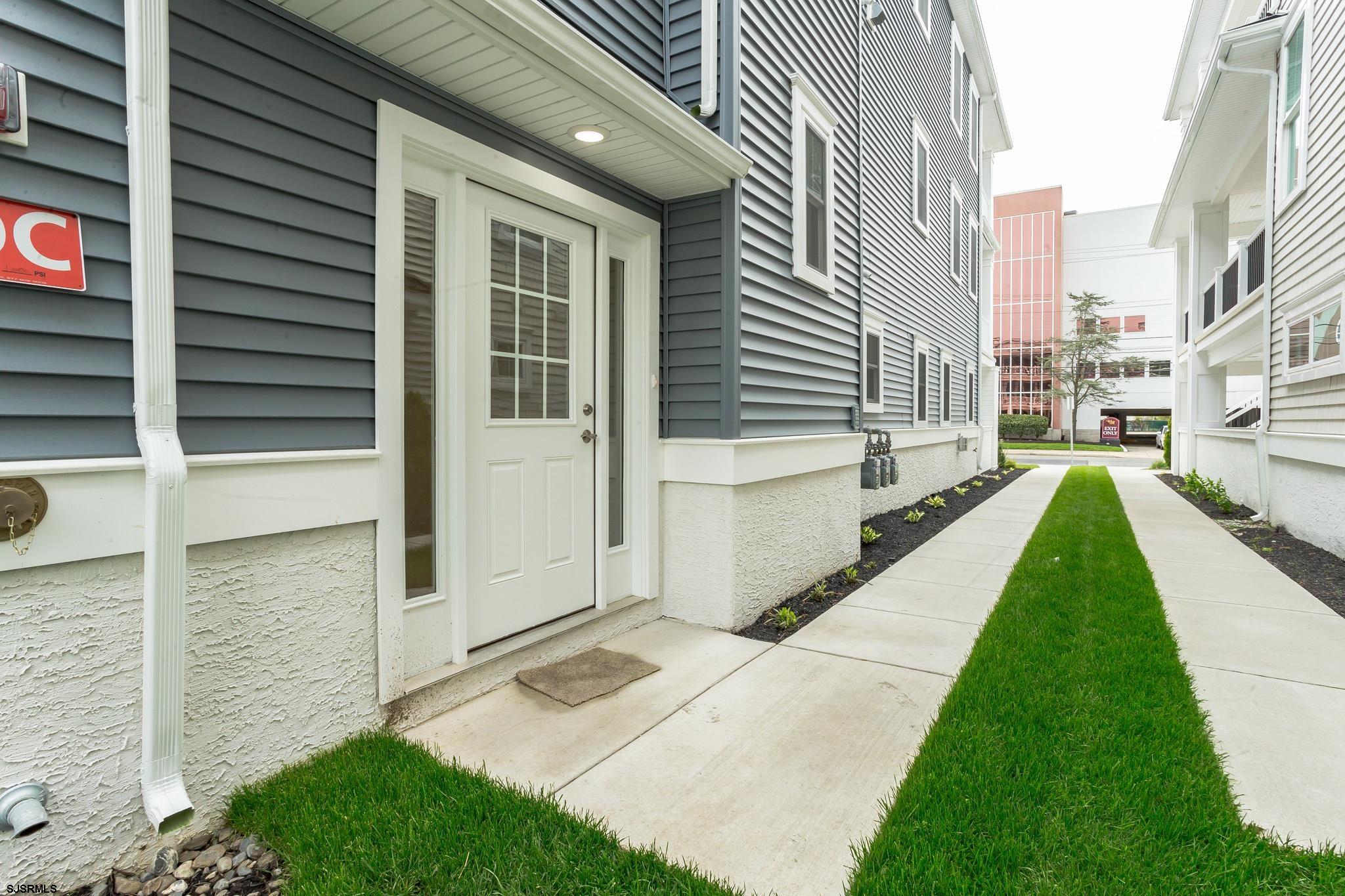 910 Ocean Avenue, Unit C Ocean City, NJ 08226 - Photo 29 of 30 a view of a house with a yard