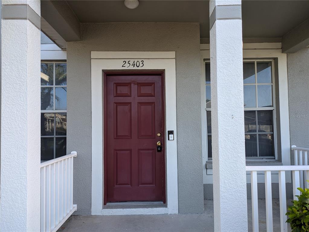 25403 Saddlehorn Way Land O Lakes, FL 34639 - Photo 2 of 18 a view of front door