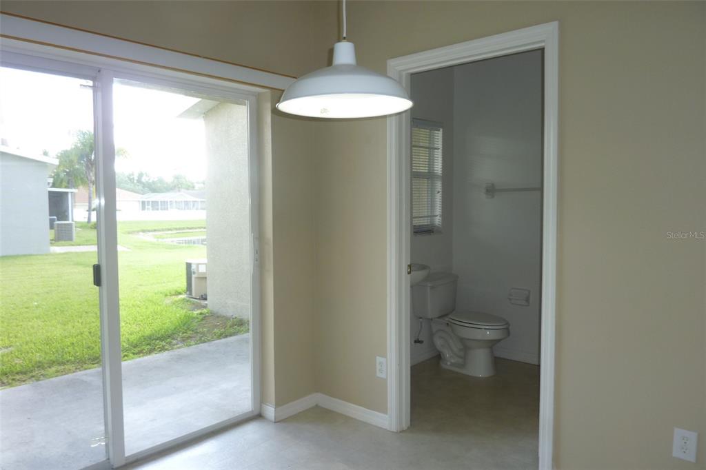 25403 Saddlehorn Way Land O Lakes, FL 34639 - Photo 7 of 18 a bathroom with a toilet and a shower