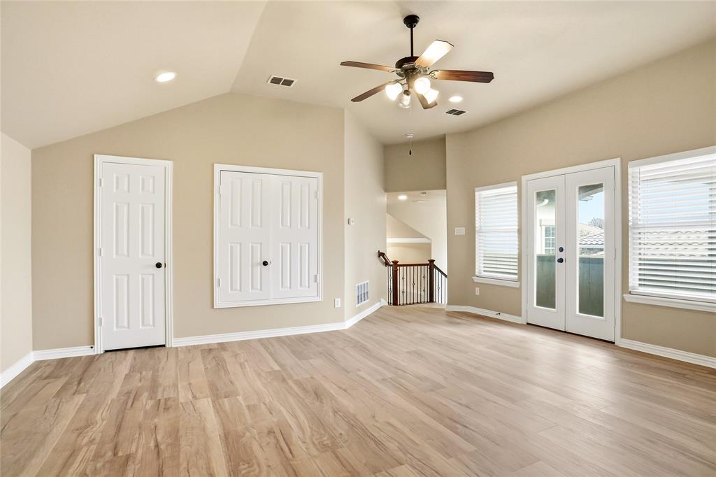 838 San Clemente Irving, TX 75039 - Photo 21 of 24 a view of an empty room with wooden floor