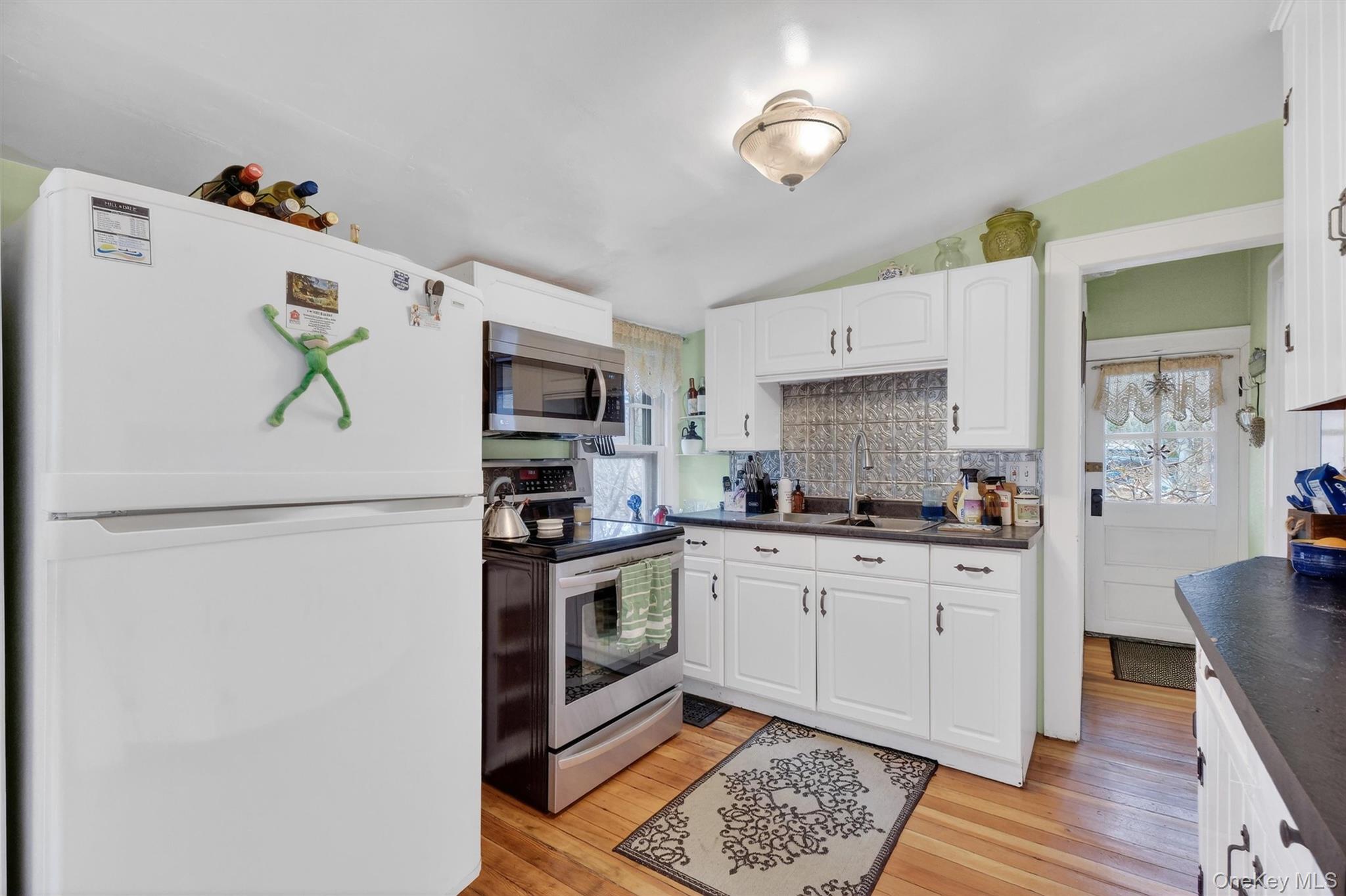 13 Perry Trail Carmel, NY 10512 - Photo 14 of 49 Convenient access to the backyard right from the kitchen