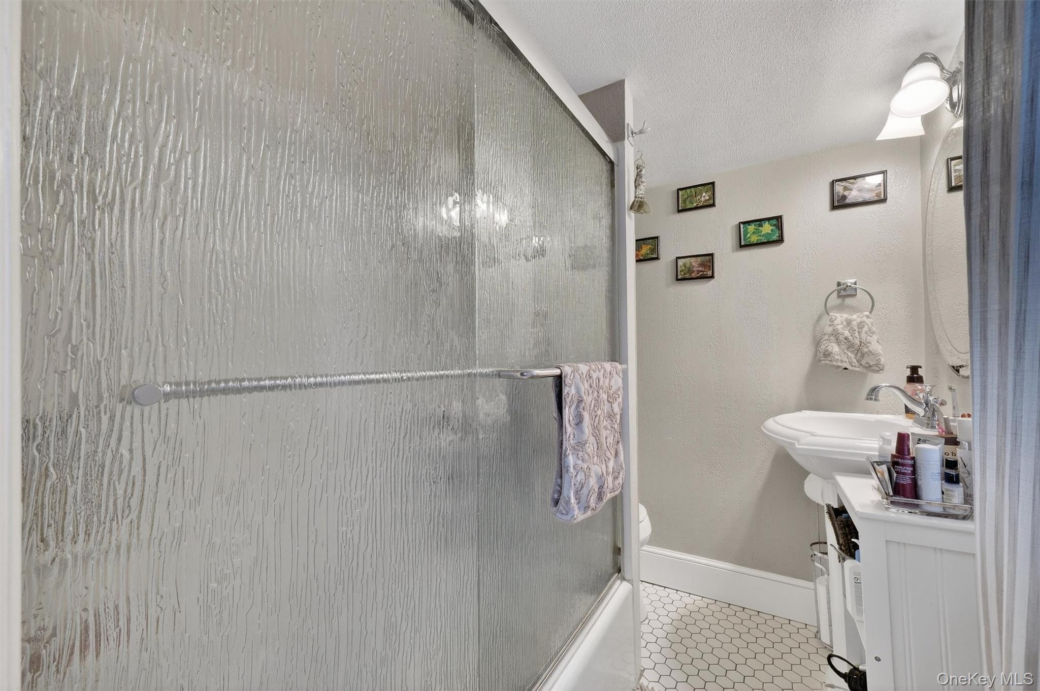 13 Perry Trail Carmel, NY 10512 - Photo 27 of 49 Main floor bathroom with tub/sink combo