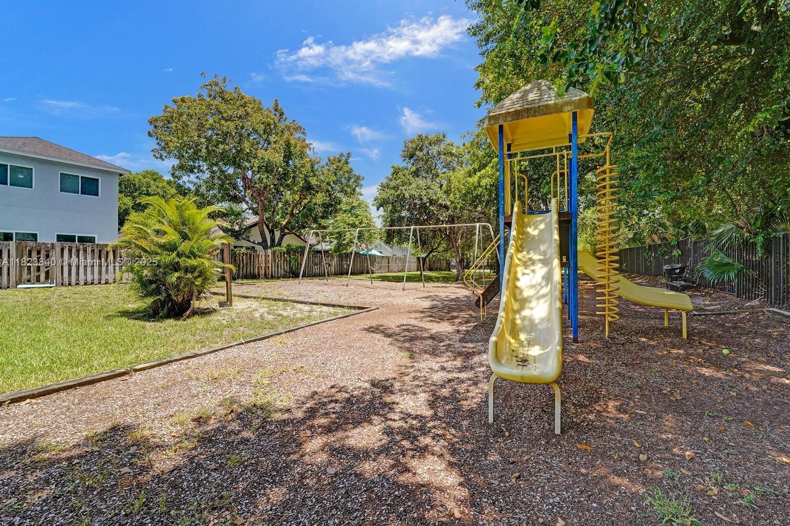 7340 Andorra Place Boca Raton, FL 33433 - Photo 21 of 99 a view of a park with a slide