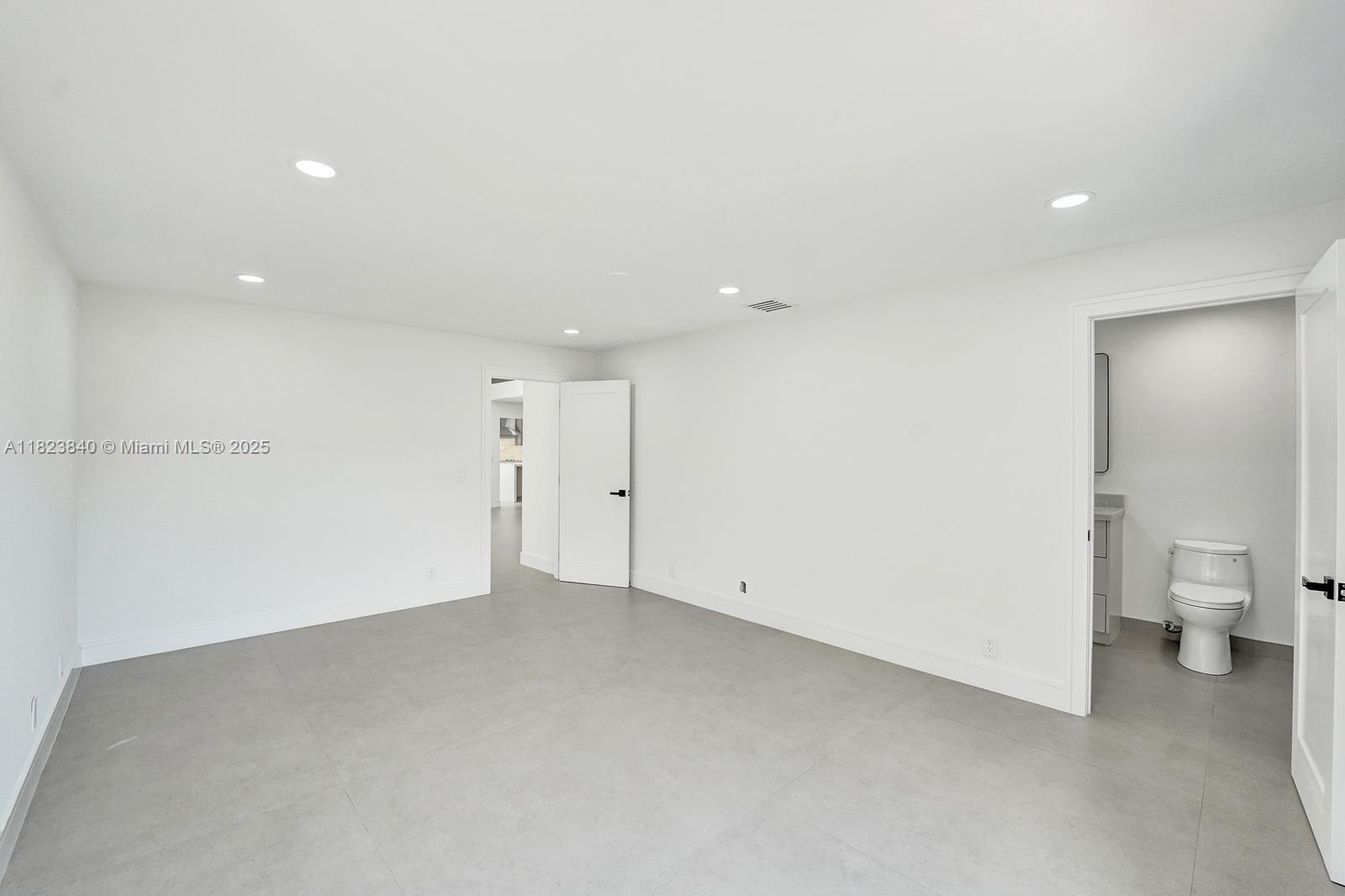 7340 Andorra Place Boca Raton, FL 33433 - Photo 50 of 99 a view of an empty room with a bathroom