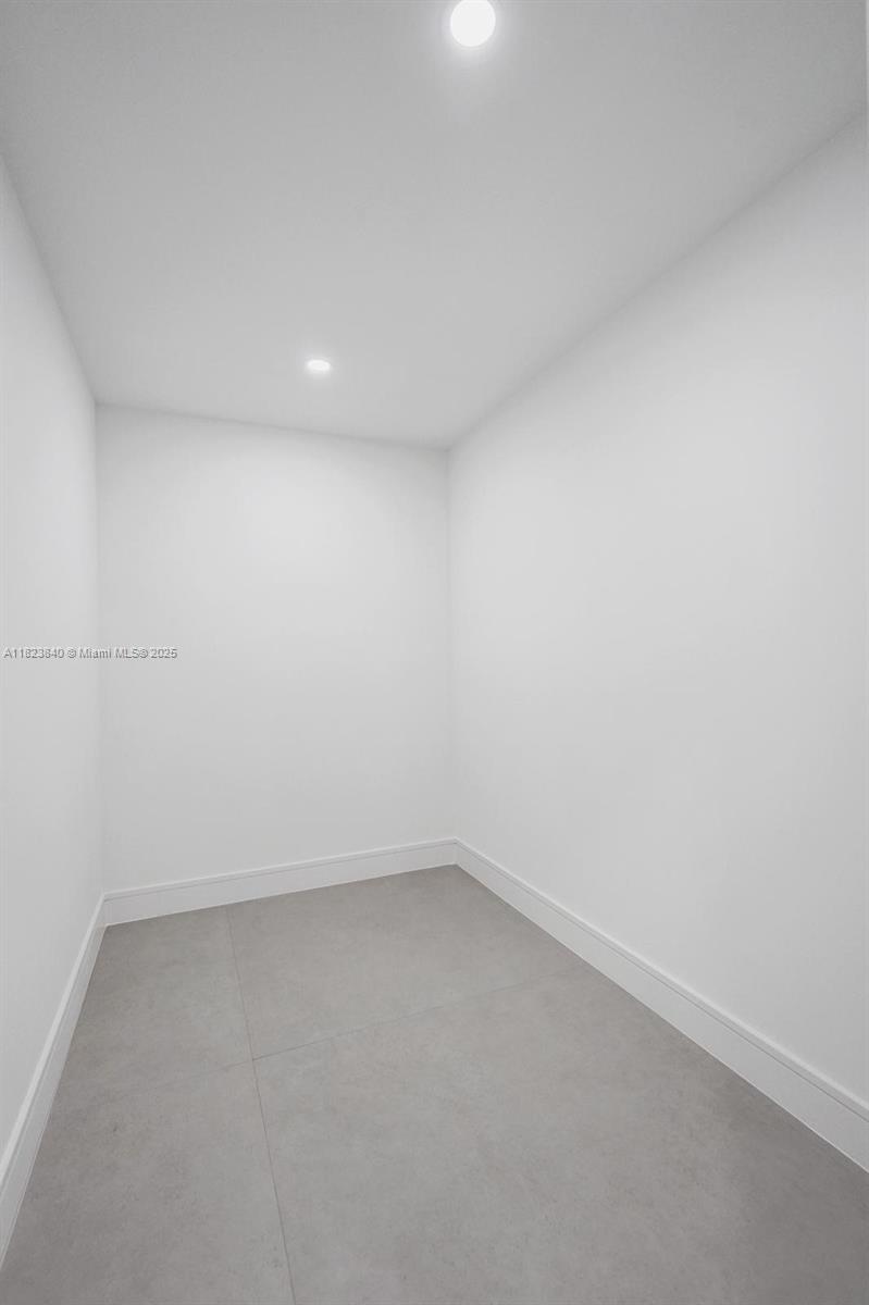 7340 Andorra Place Boca Raton, FL 33433 - Photo 51 of 99 a view of an empty room