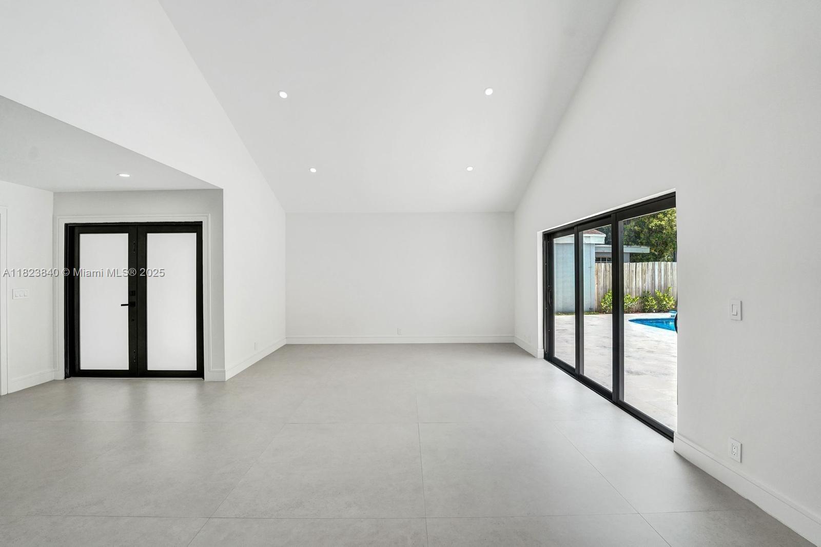 7340 Andorra Place Boca Raton, FL 33433 - Photo 52 of 99 a view of an empty room with a window