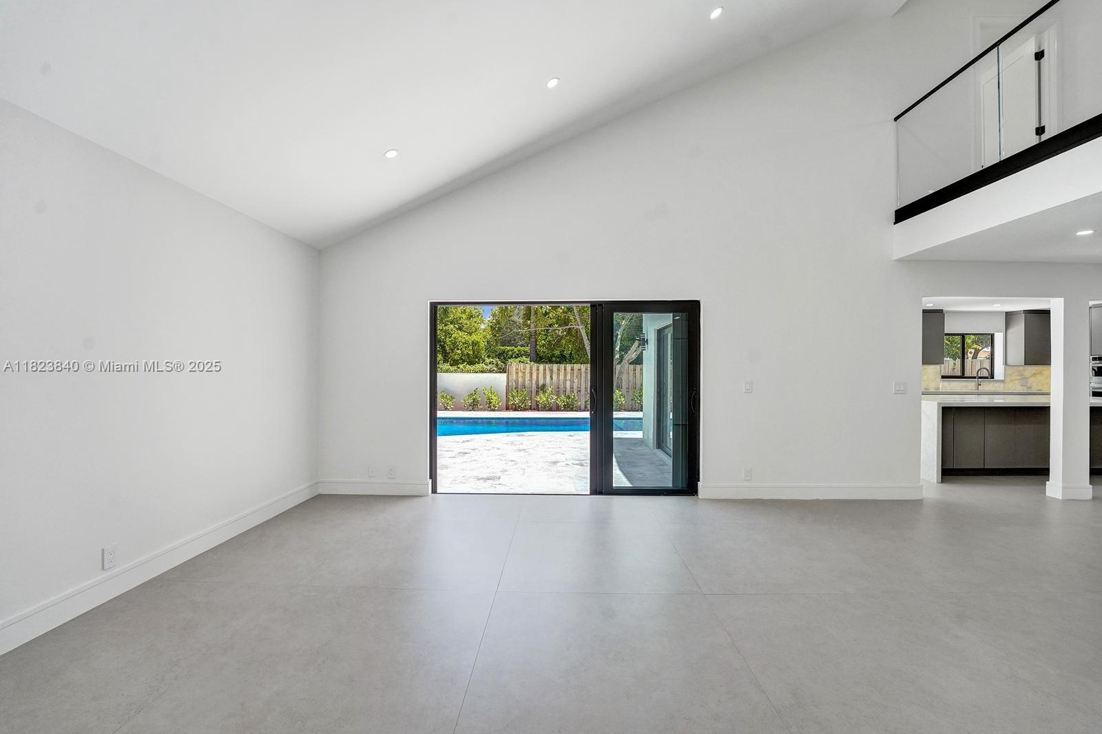 7340 Andorra Place Boca Raton, FL 33433 - Photo 78 of 99 a view of an empty room with a window