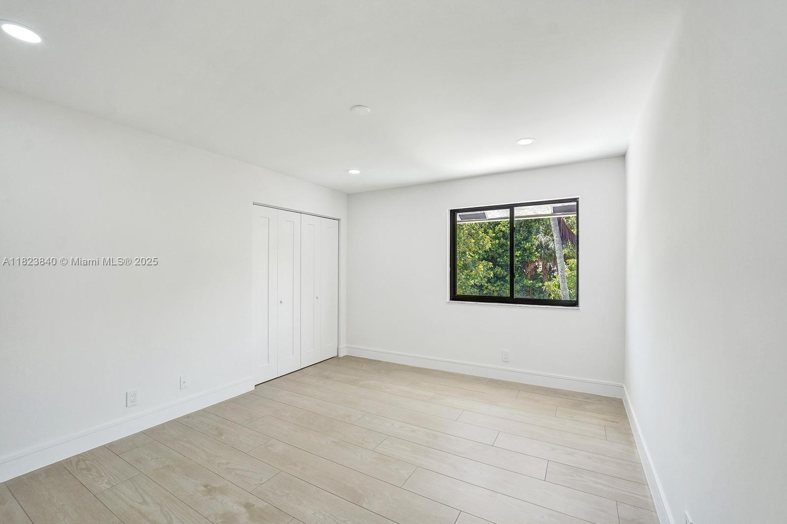 7340 Andorra Place Boca Raton, FL 33433 - Photo 96 of 99 a view of an empty room with a window