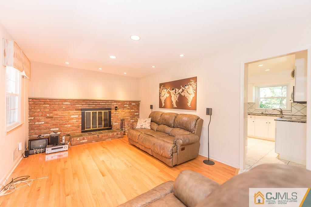 24 Taylor Road Princeton, NJ 08540 - Photo 3 of 25 a living room with furniture and a large window with outer view