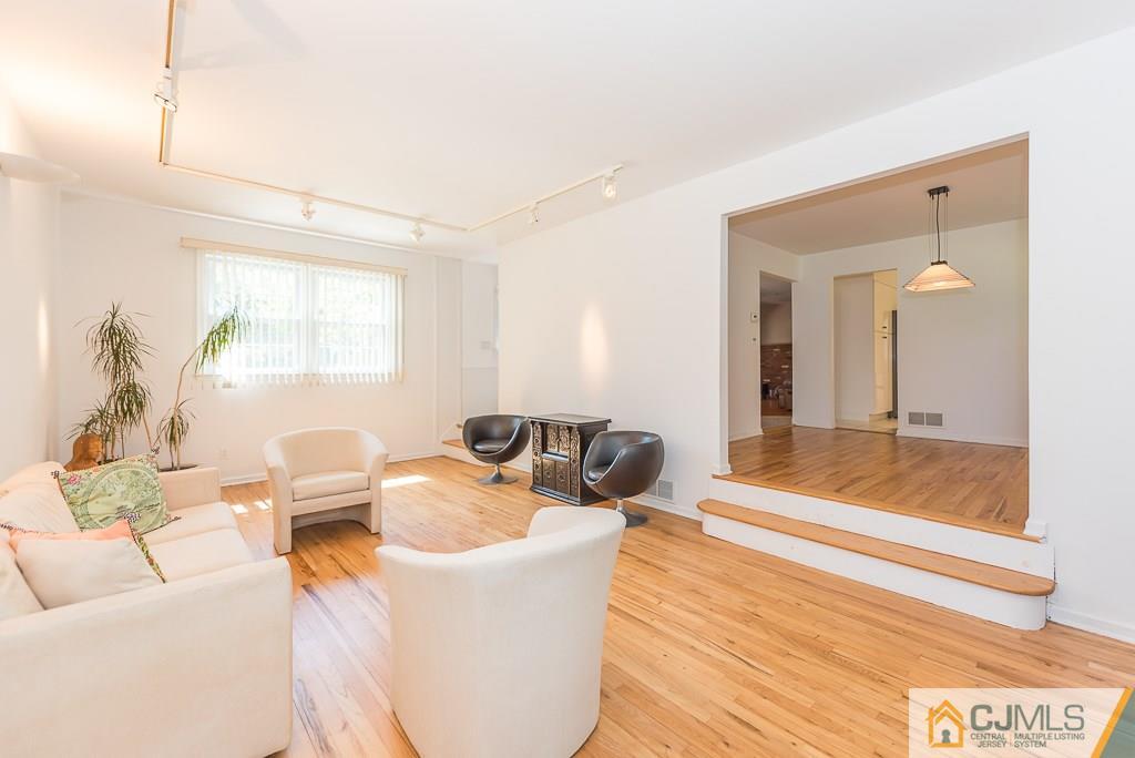 24 Taylor Road Princeton, NJ 08540 - Photo 10 of 25 a living room with furniture and a large window