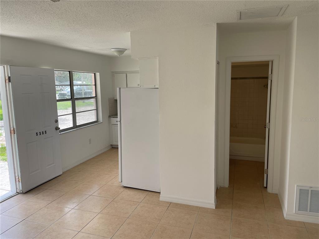 5305 Avery Road New Port Richey, FL 34652 - Photo 22 of 29 a view of an empty room with a window