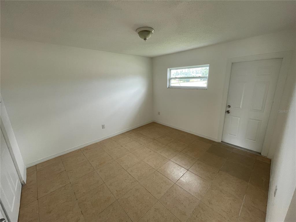 5305 Avery Road New Port Richey, FL 34652 - Photo 27 of 29 an empty room with a window