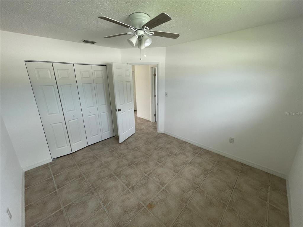 5305 Avery Road New Port Richey, FL 34652 - Photo 9 of 29 wooden floor in an empty room