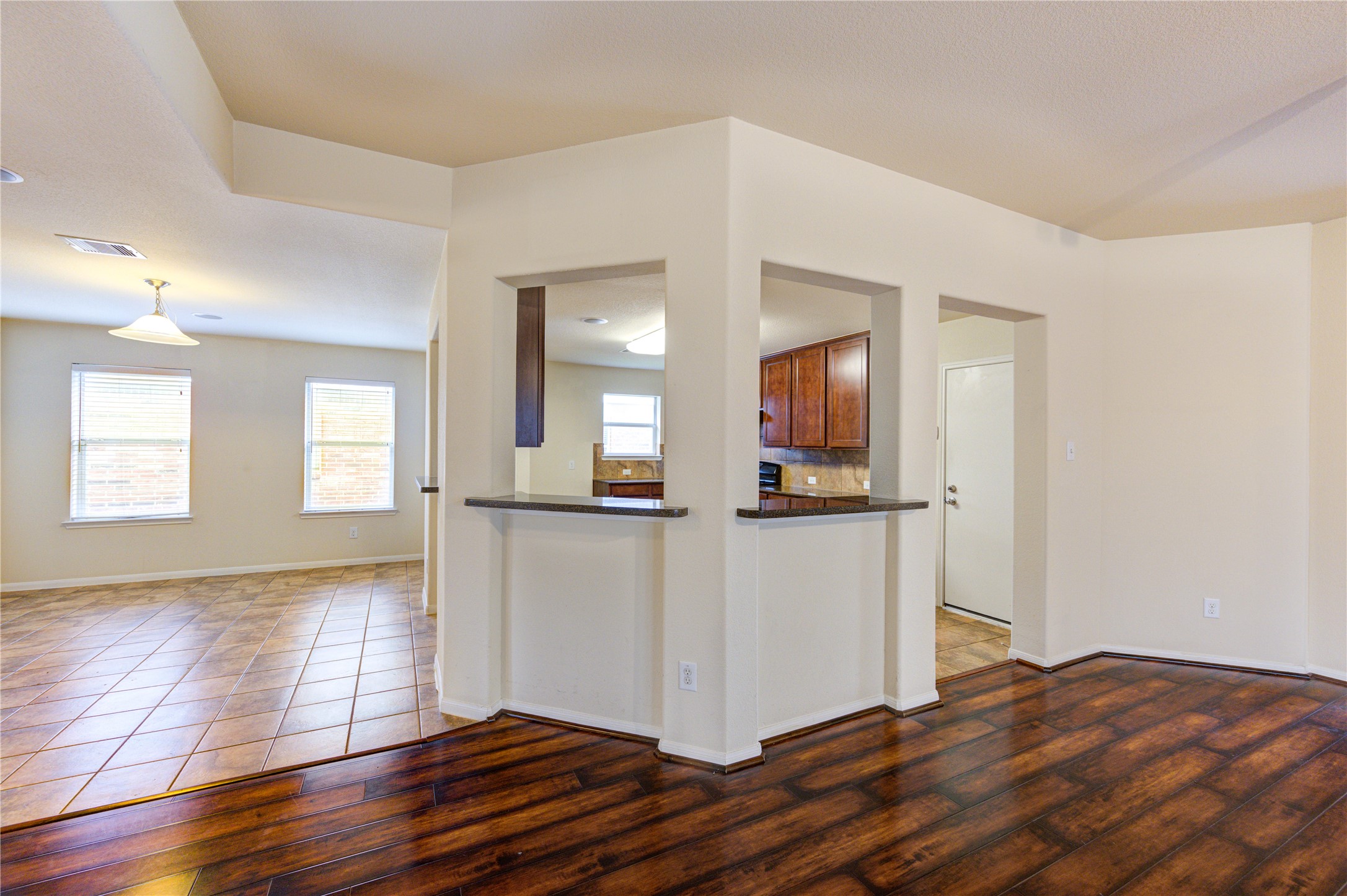 2922 Halcyon Time Trail Houston, TX 77045 - Photo 19 of 50 a view of a living room with wooden floor