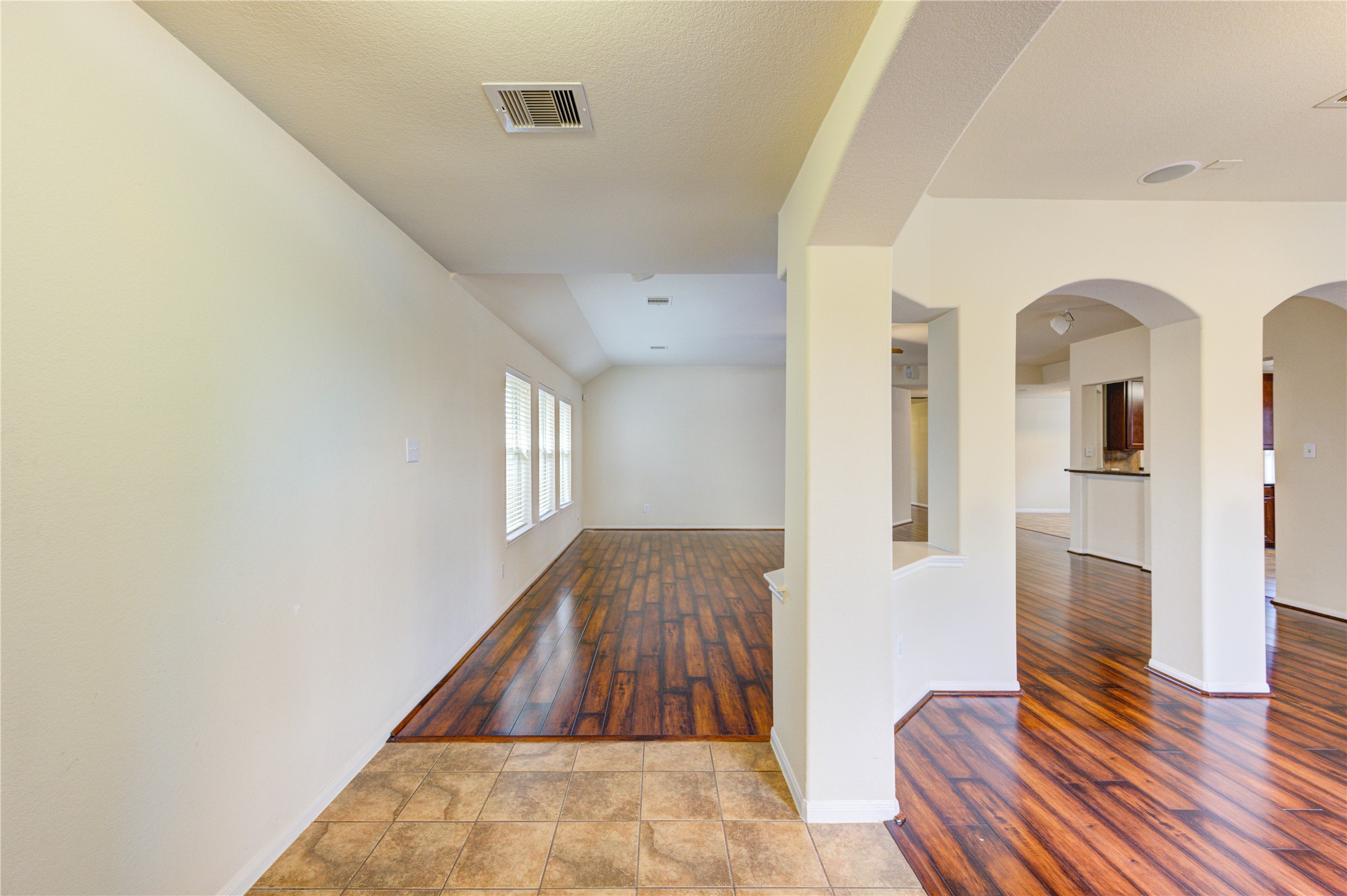 2922 Halcyon Time Trail Houston, TX 77045 - Photo 8 of 50 a view of entryway with wooden floor