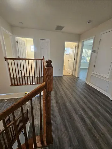 a view of an entryway with a hardwood