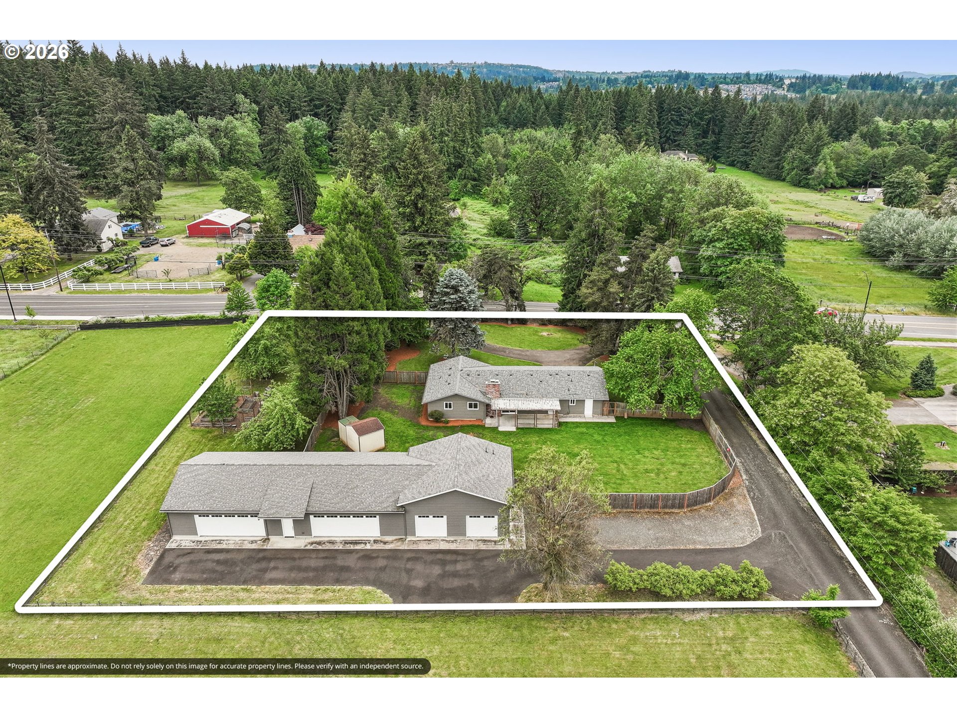 22600 Northeast 28th Street Camas, WA 98607 - Photo 44 of 48 a view of a swimming pool and a yard