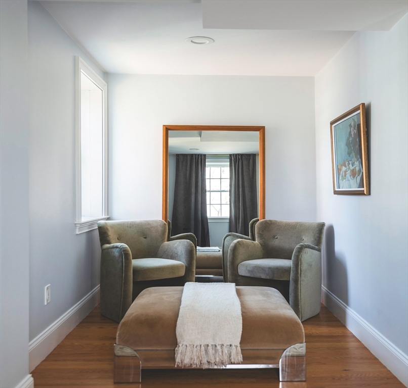 64 County Road, Unit 1 Ipswich, MA 01938 - Photo 17 of 33 a living room with furniture and a window