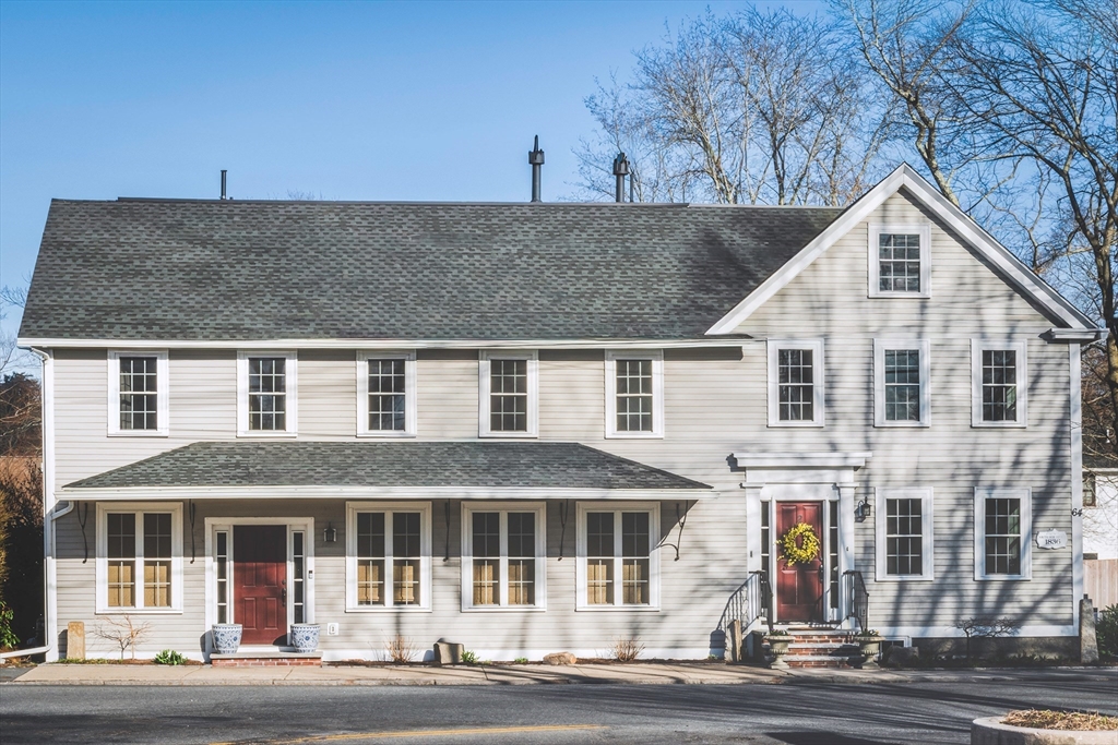 64 County Road, Unit 1 Ipswich, MA 01938 - Photo 31 of 33 a view of a white building among the street