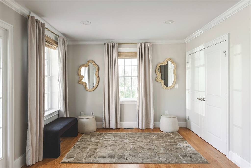 64 County Road, Unit 1 Ipswich, MA 01938 - Photo 10 of 33 a view of a room with wooden floor and windows