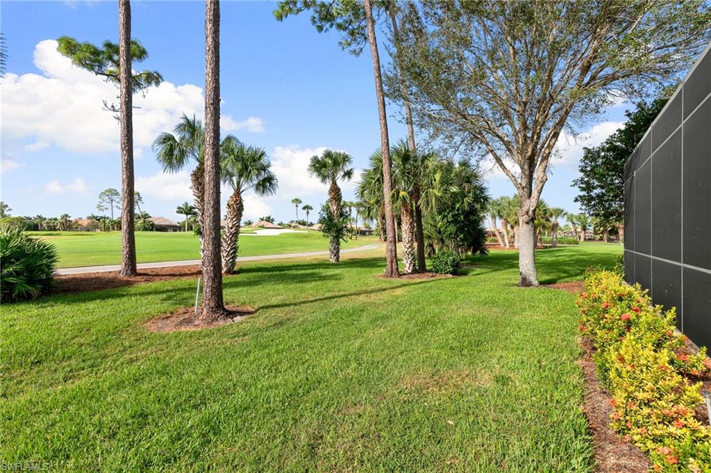 7563 Moorgate Point Way Naples, FL 34113 - Photo 11 of 40 a view of a park with tree s