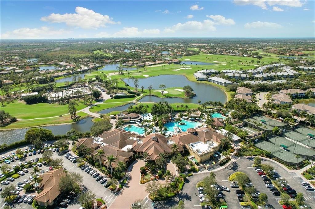 7563 Moorgate Point Way Naples, FL 34113 - Photo 34 of 40 an aerial view of residential houses with outdoor space