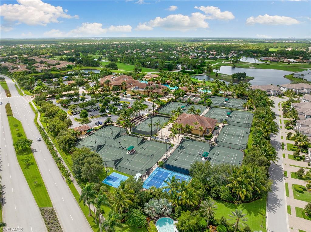 7563 Moorgate Point Way Naples, FL 34113 - Photo 40 of 40 an aerial view of residential houses with outdoor space and river