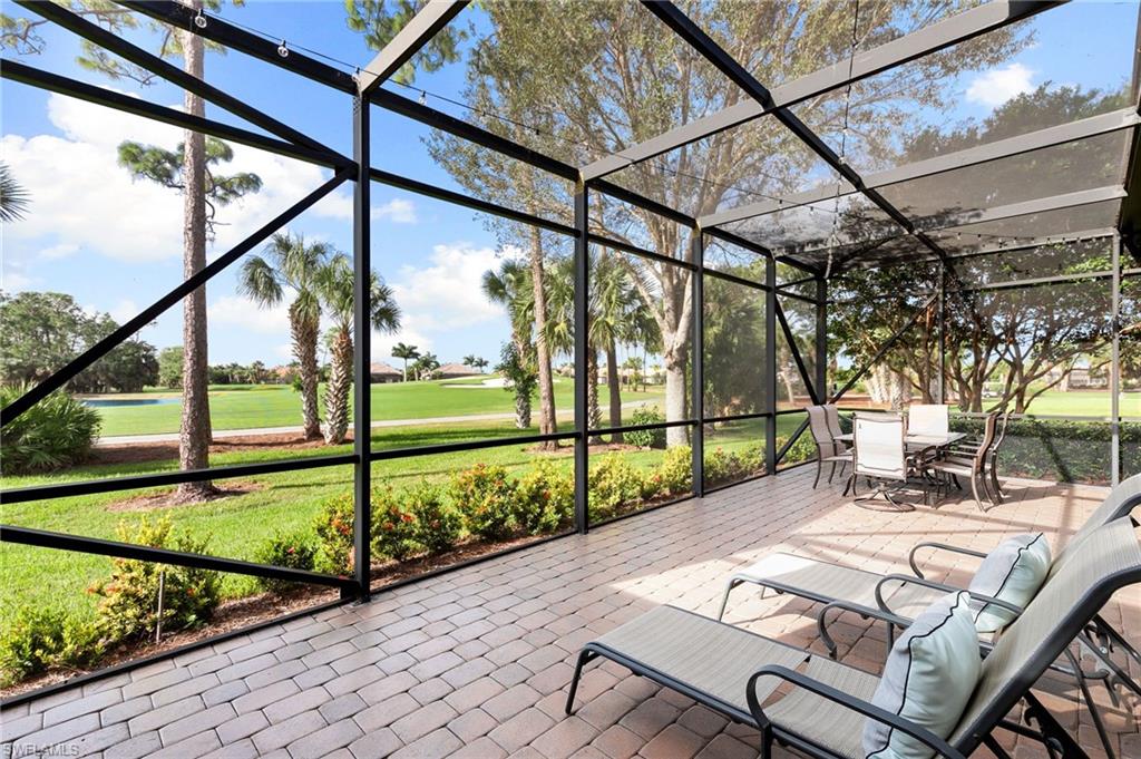 7563 Moorgate Point Way Naples, FL 34113 - Photo 5 of 40 a view of outdoor space with seating