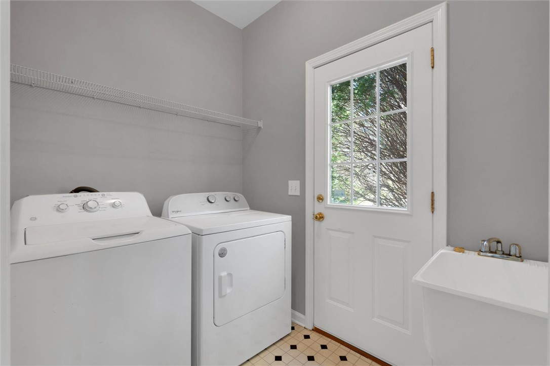 204 Red Maple Way Clemson, SC 29631 - Photo 35 of 48 This functional laundry room features convenient storage and direct outdoor access.