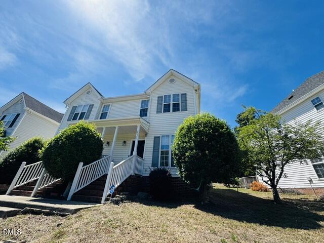 2027 Turtle Point Drive Raleigh, NC 27604 - Photo 1 of 18 a front view of a house with a yard