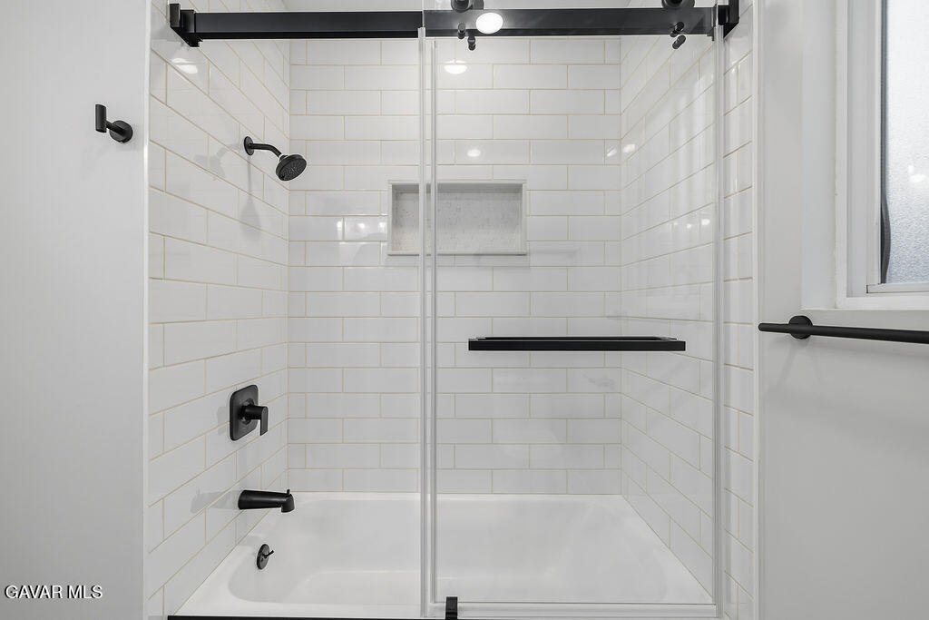 10557 Reseda Boulevard Porter Ranch, CA 91326 - Photo 23 of 37 a bathroom with a shower