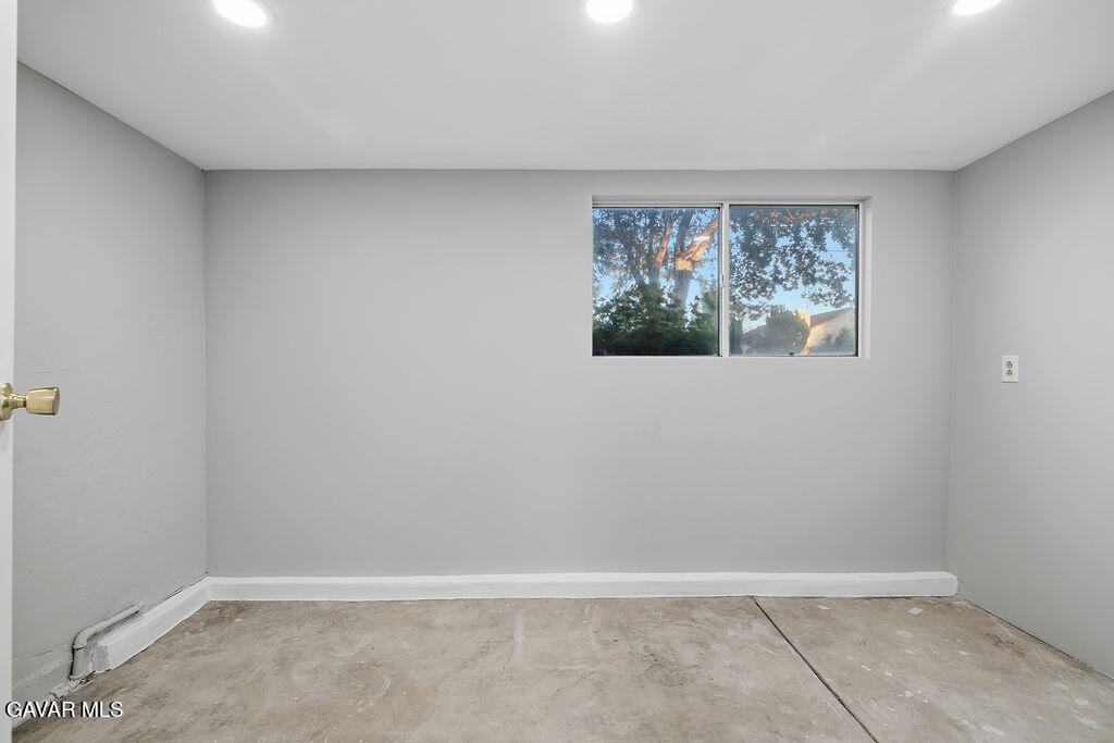 10557 Reseda Boulevard Porter Ranch, CA 91326 - Photo 28 of 37 a view of an empty room with a window