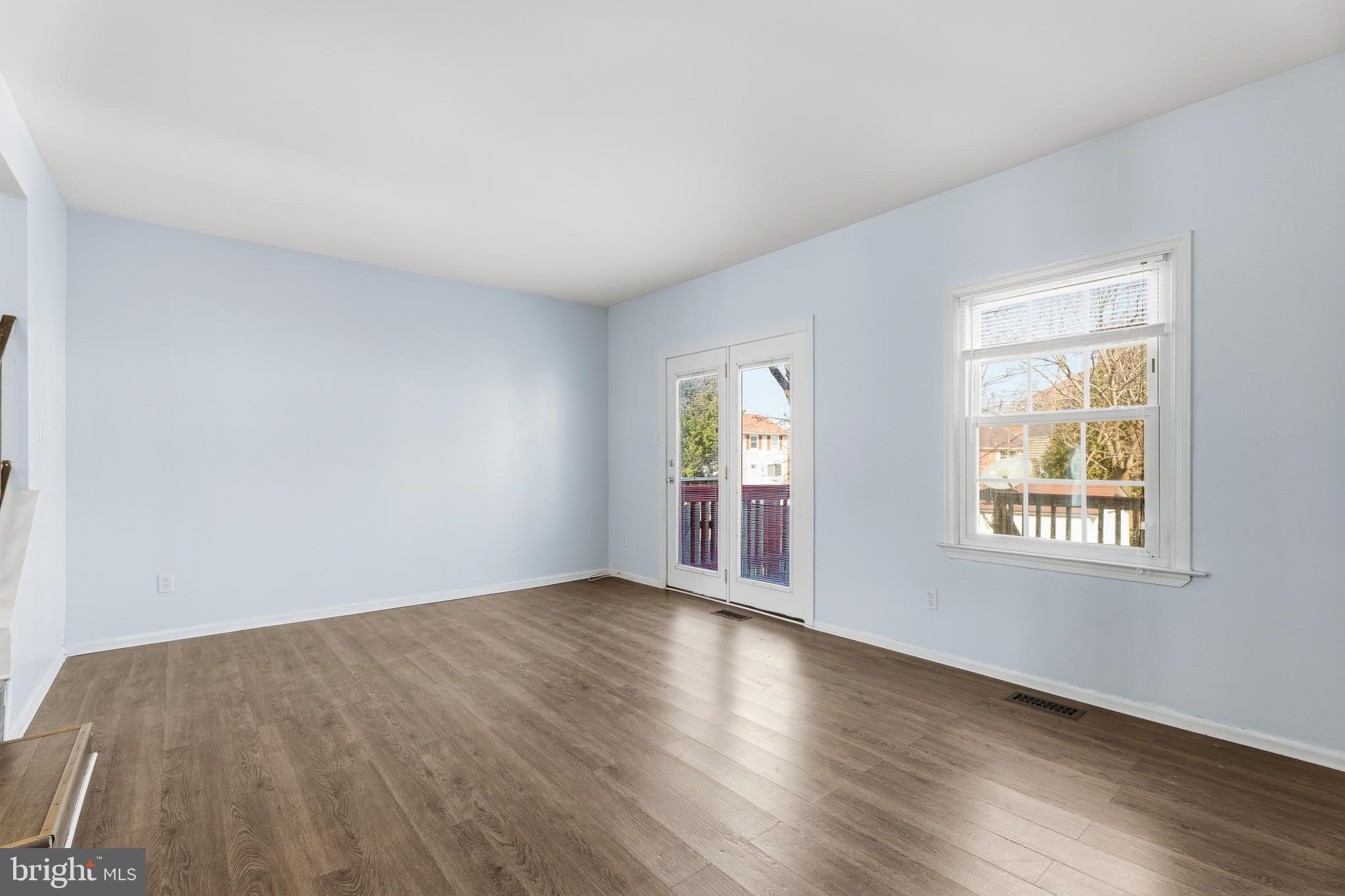 8 Bardia Court Rosedale, MD 21237 - Photo 16 of 37 Living Room with sliders to deck
