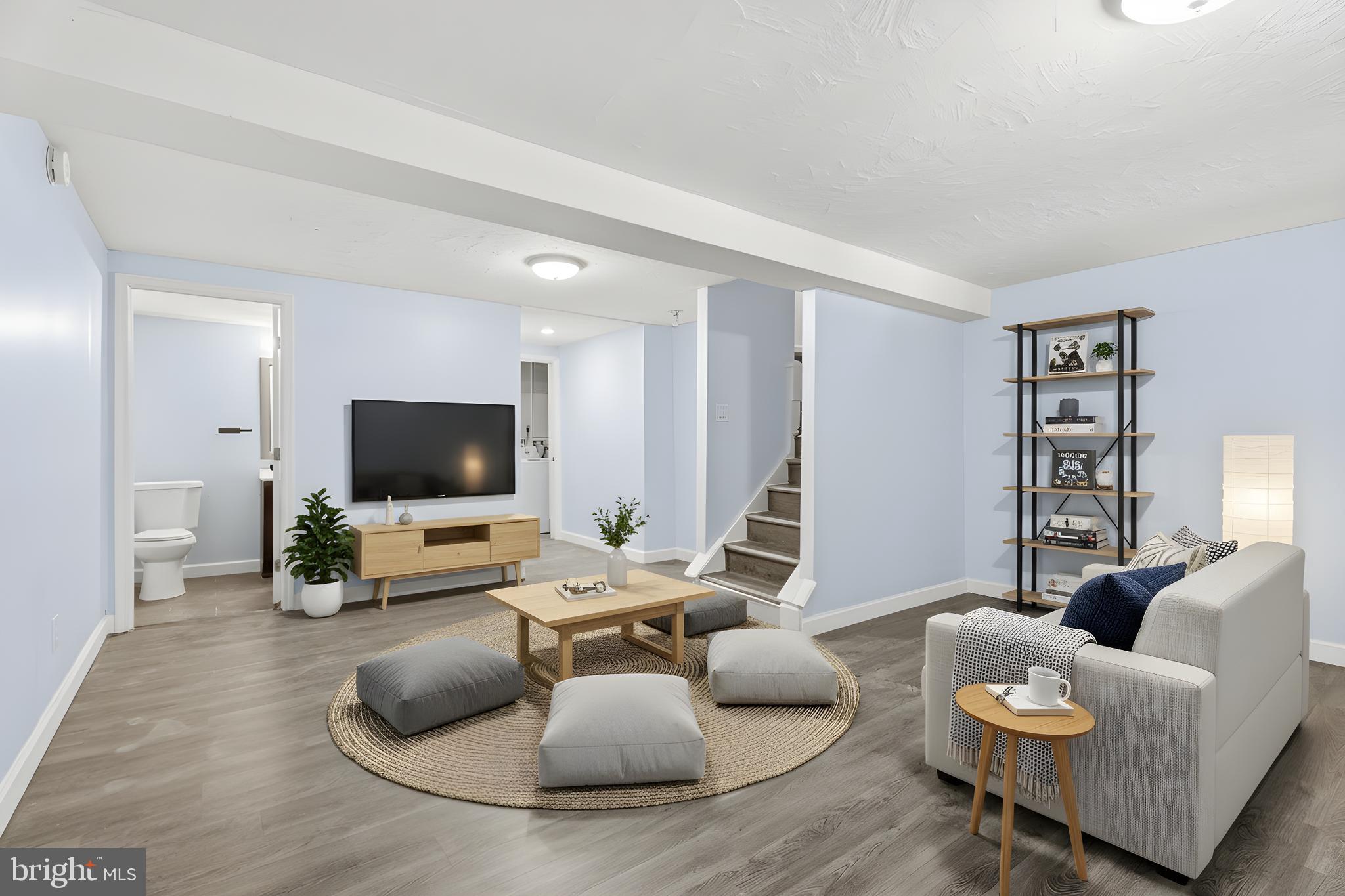 8 Bardia Court Rosedale, MD 21237 - Photo 31 of 37 Staged photo lower level family room