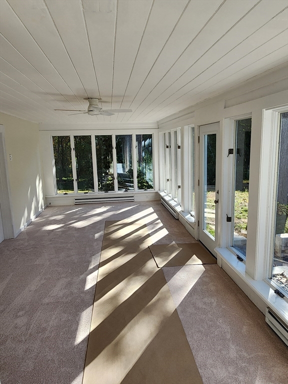 236 Pondview Drive Springfield, MA 01118 - Photo 18 of 23 a view of a patio with table and chairs