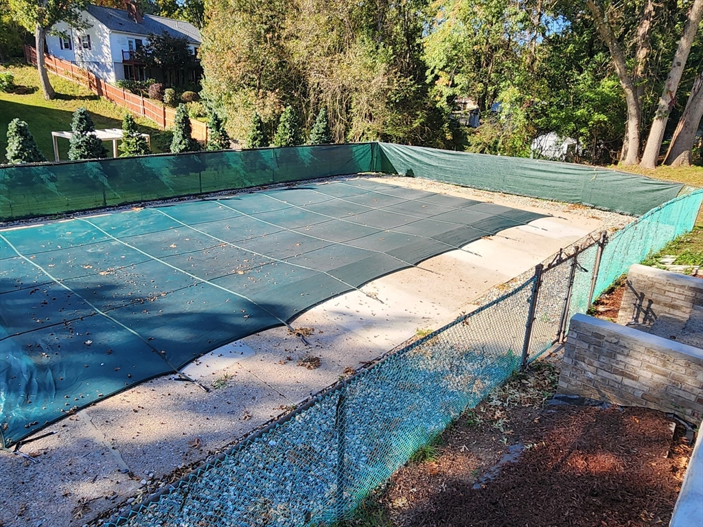 236 Pondview Drive Springfield, MA 01118 - Photo 4 of 23 a view of a yard with basketball court
