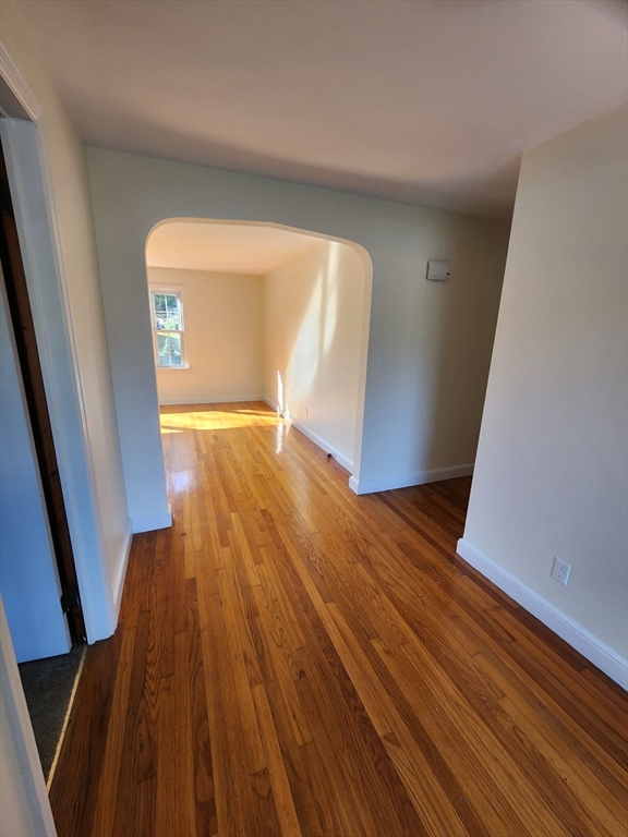 236 Pondview Drive Springfield, MA 01118 - Photo 5 of 23 wooden floor in a hall with an entryway