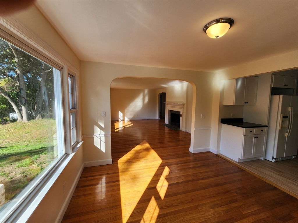 236 Pondview Drive Springfield, MA 01118 - Photo 10 of 23 a view of a living room and a wooden floor