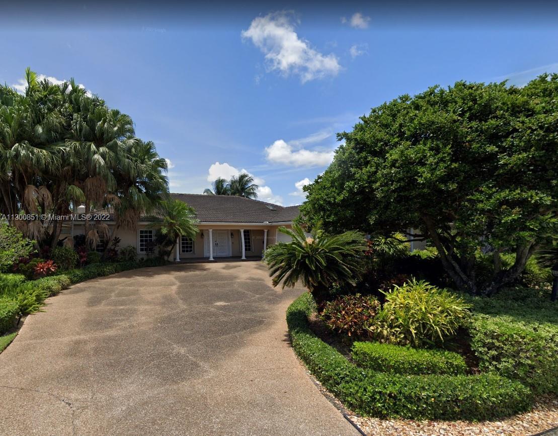 4430 Casper Court Hollywood, FL 33021 - Photo 1 of 2 a front view of a house with a yard