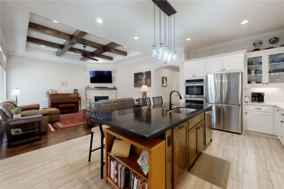 3425 Dovecote Way Bryan, TX 77808 - Photo 5 of 27 Kitchen and family room