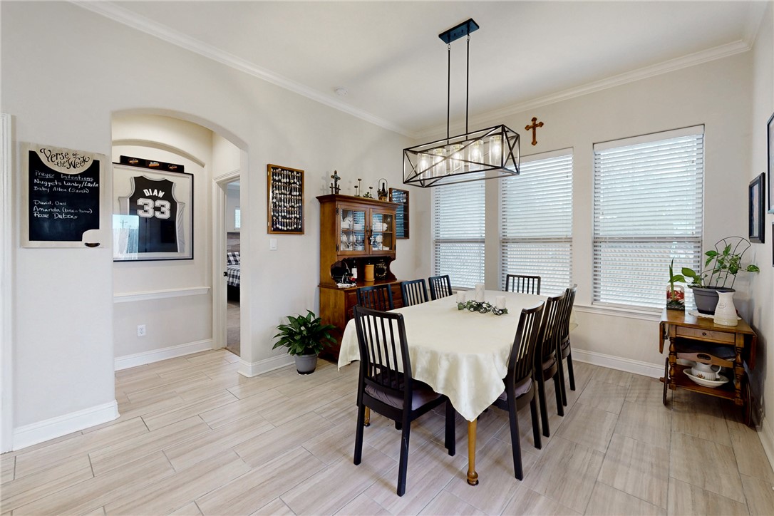 3425 Dovecote Way Bryan, TX 77808 - Photo 6 of 27 Just off the kitchen the dining room is open but separate