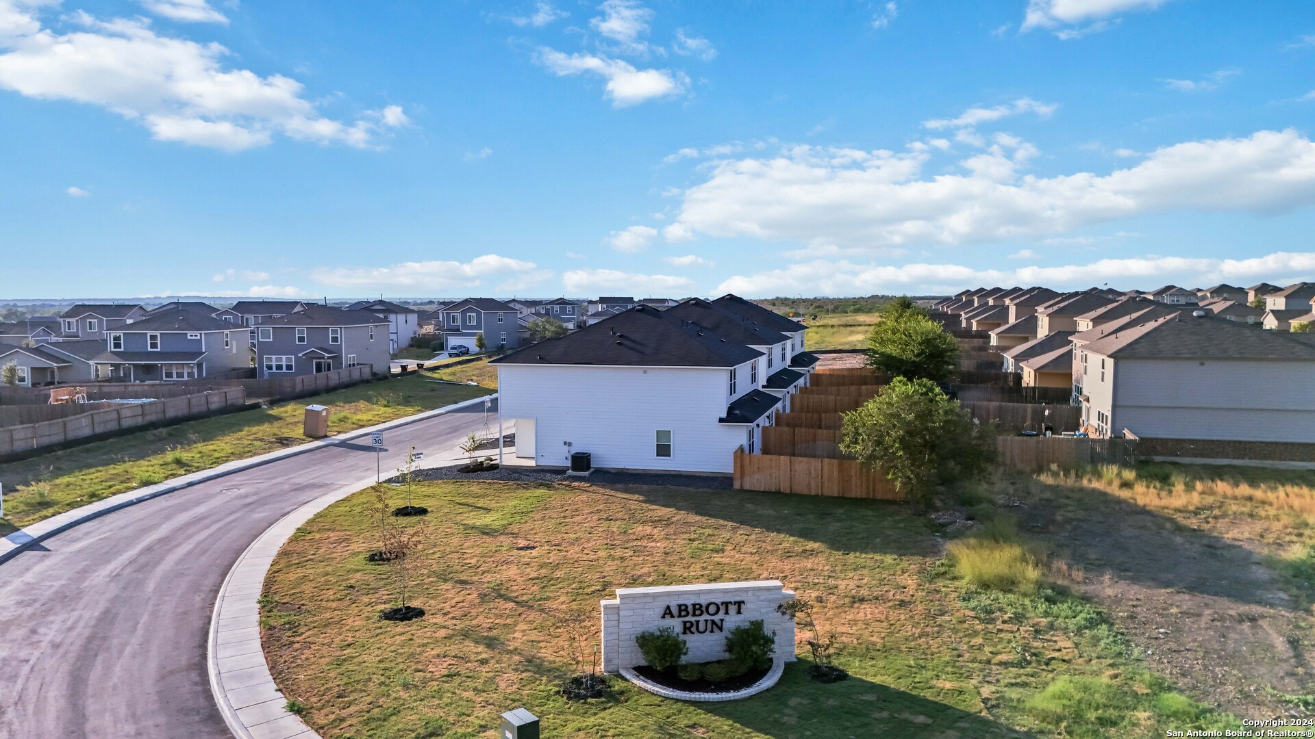 3924 Abbott Pass St. Hedwig, TX 78152 - Photo 42 of 45 an aerial view of a house