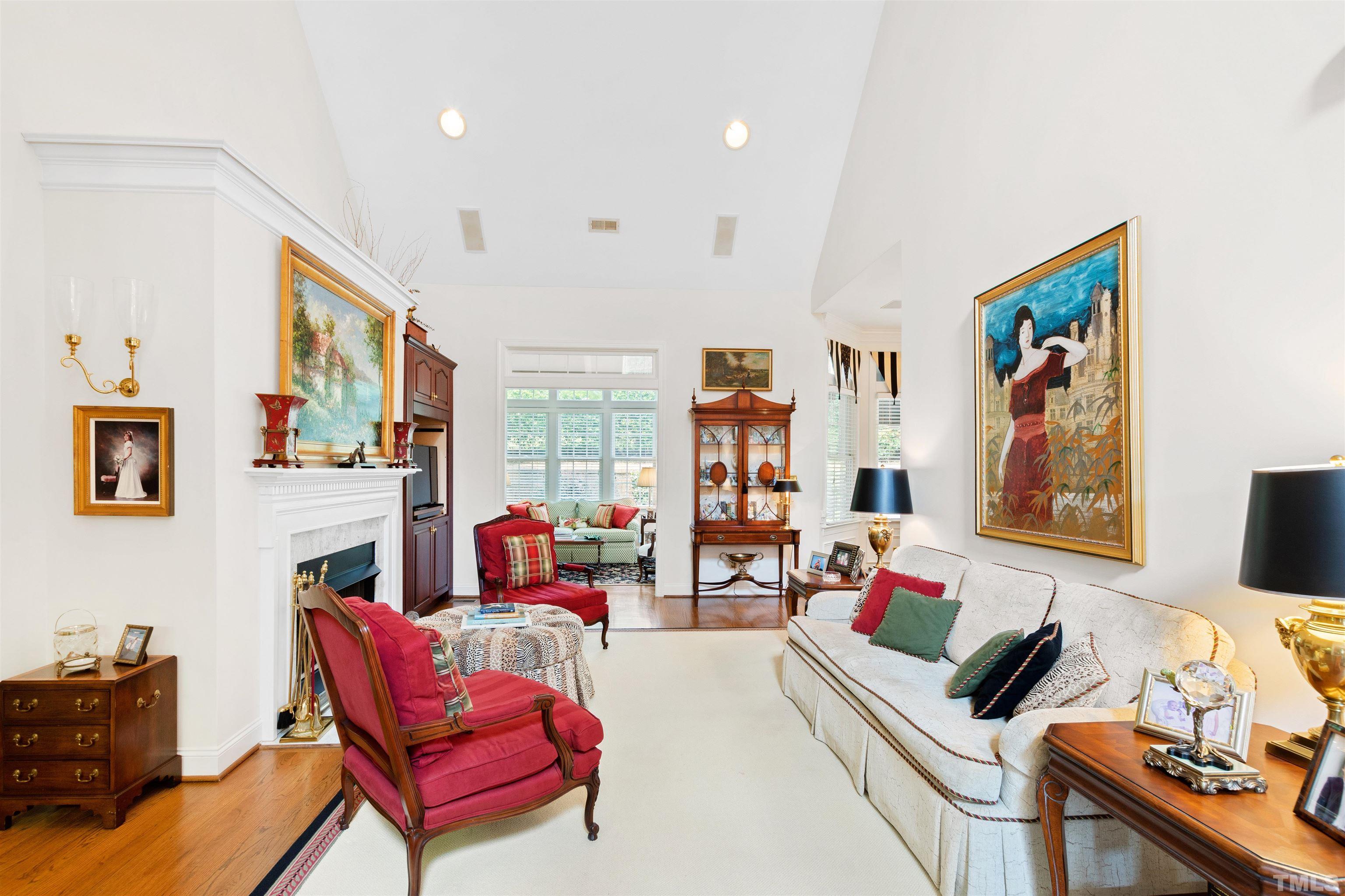 306 Lake Boone Trail Raleigh, NC 27608 - Photo 13 of 55 a living room with furniture and a flat screen tv