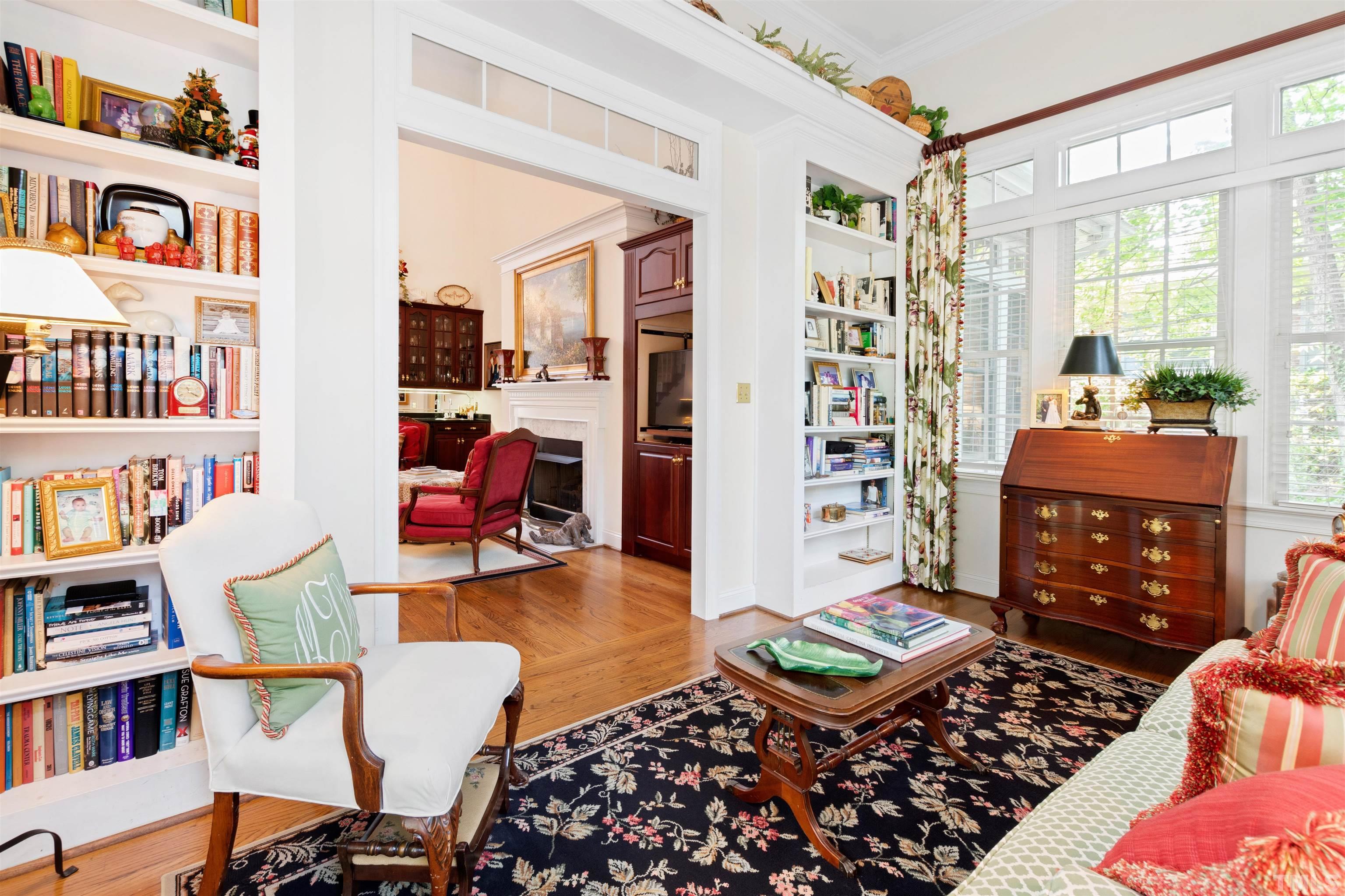 306 Lake Boone Trail Raleigh, NC 27608 - Photo 14 of 55 a living room with furniture and a book shelf