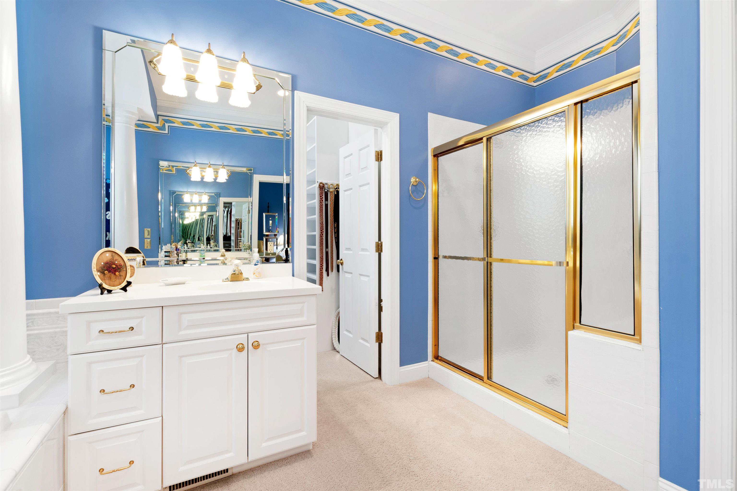 306 Lake Boone Trail Raleigh, NC 27608 - Photo 28 of 55 a bathroom with a double vanity sink and mirror