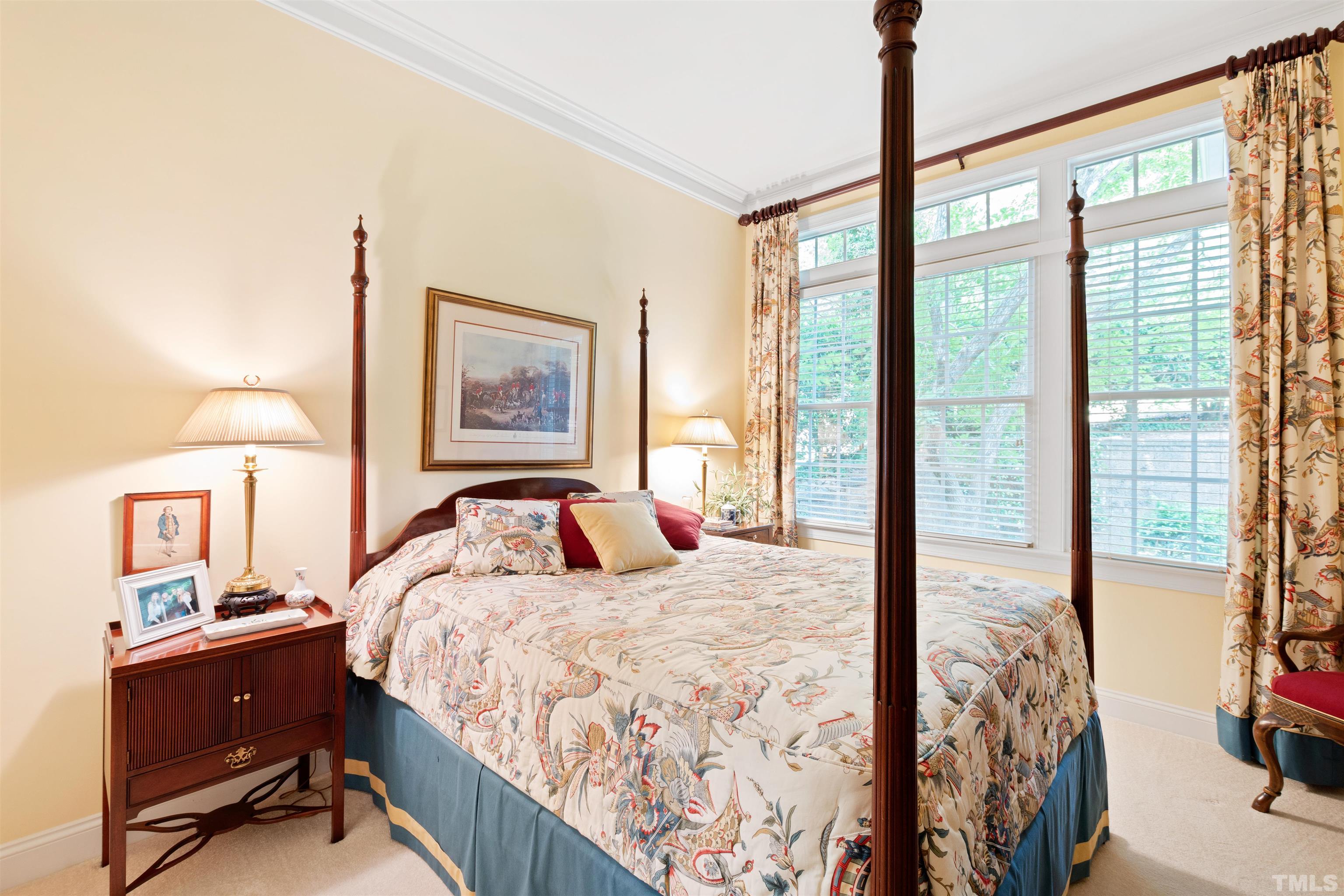 306 Lake Boone Trail Raleigh, NC 27608 - Photo 32 of 55 a bedroom with a large bed and a window