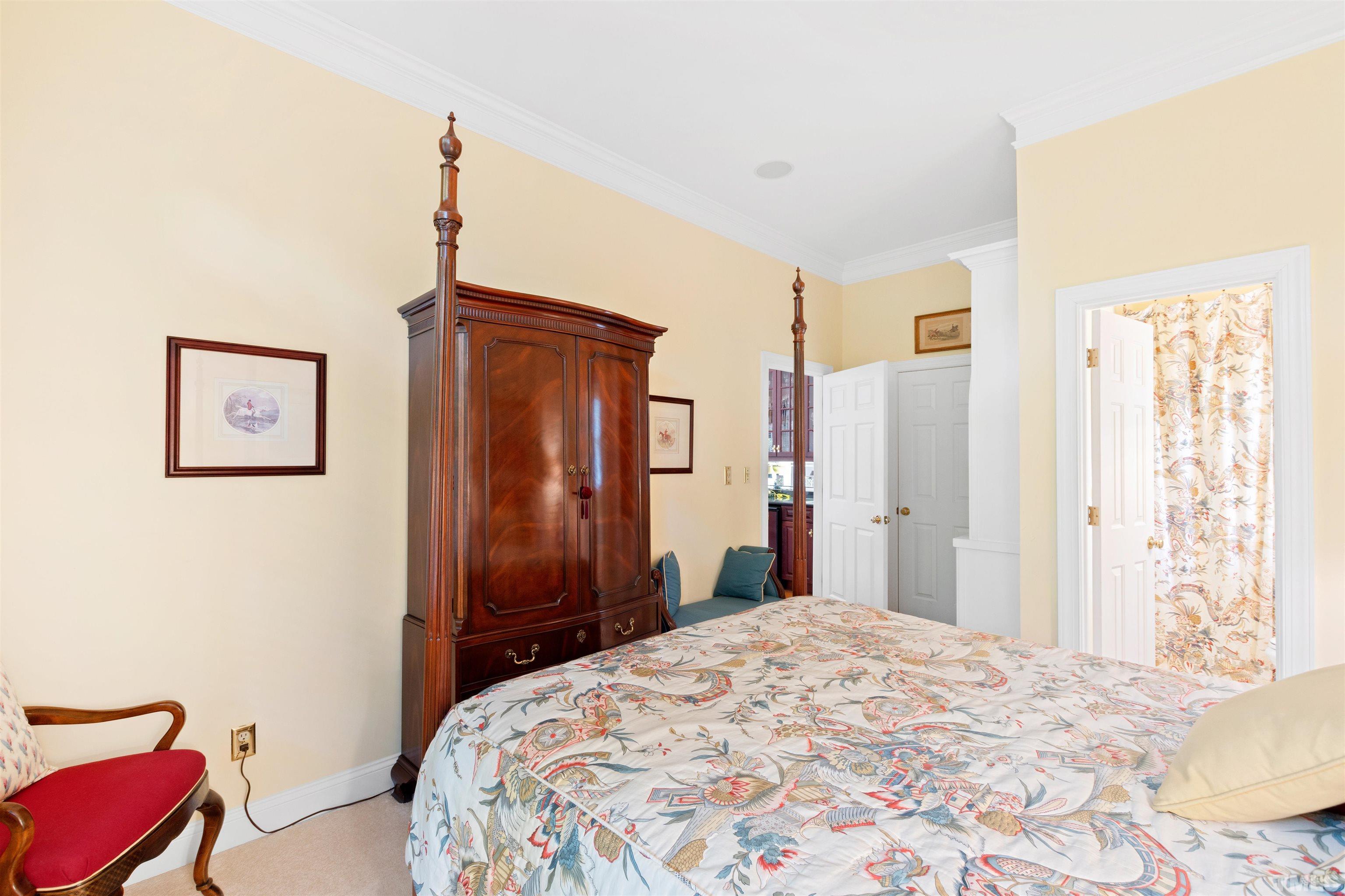 306 Lake Boone Trail Raleigh, NC 27608 - Photo 34 of 55 a bedroom with a bed and a dresser