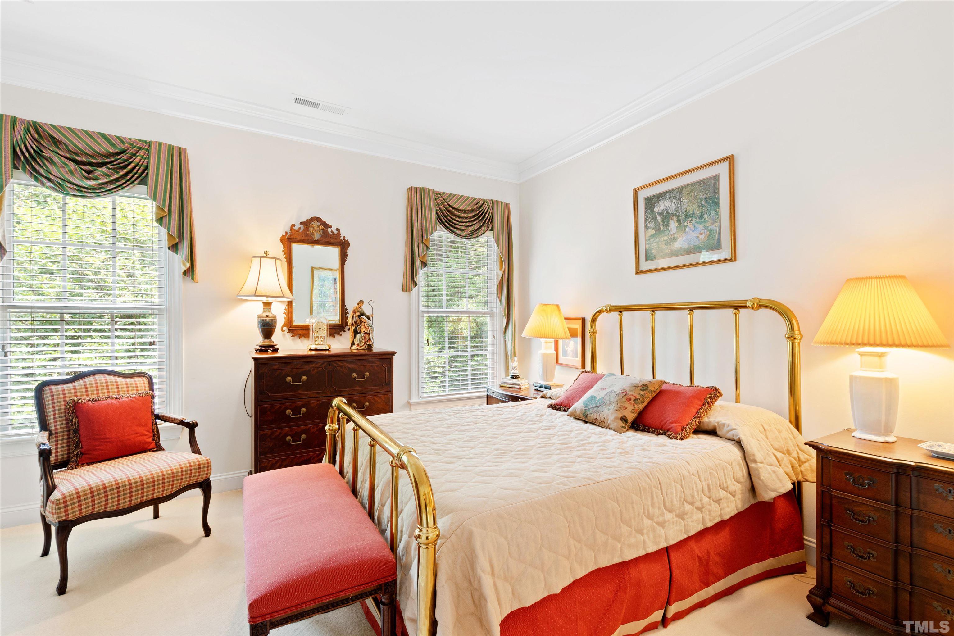 306 Lake Boone Trail Raleigh, NC 27608 - Photo 37 of 55 a bedroom with a bed and wooden floor