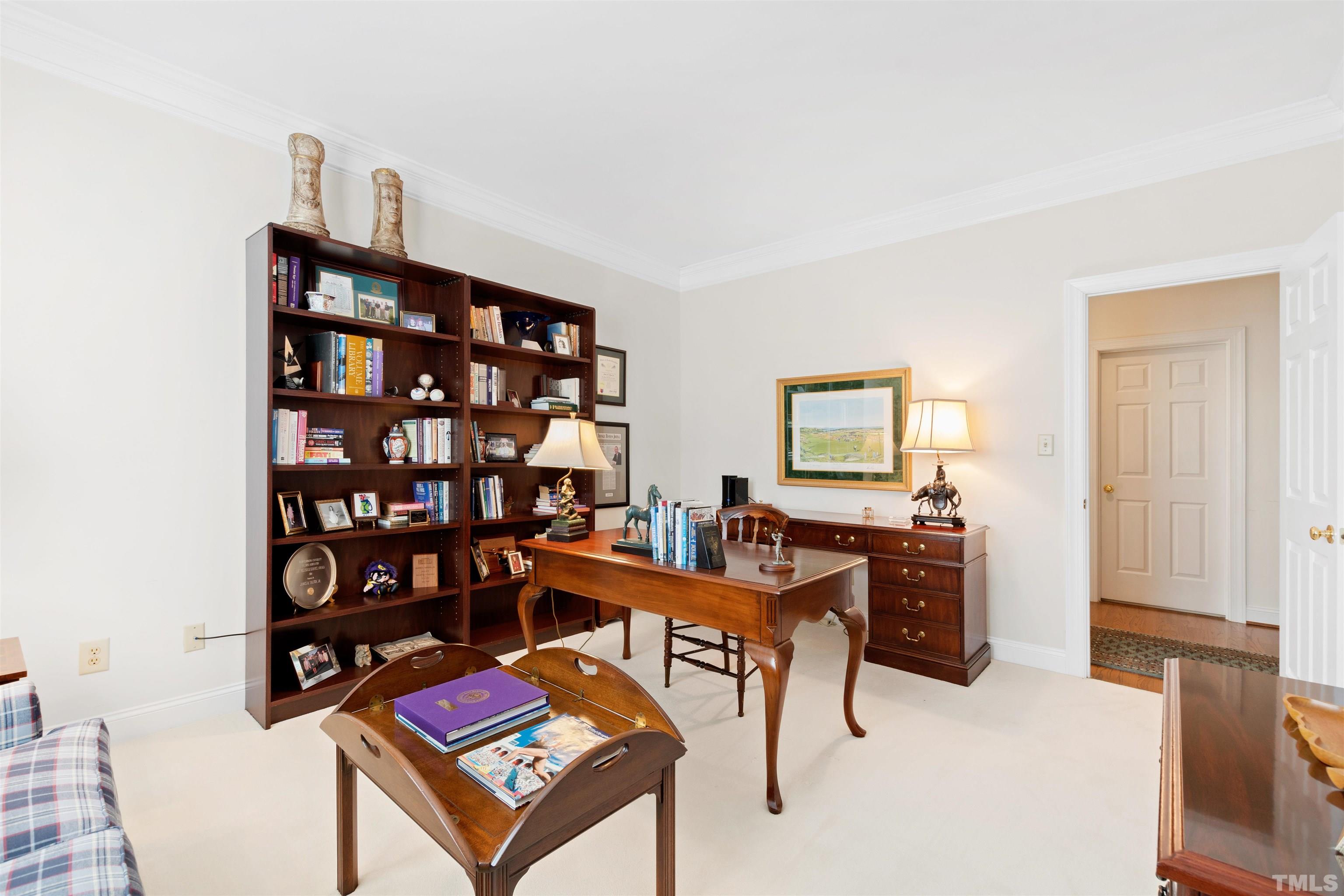 306 Lake Boone Trail Raleigh, NC 27608 - Photo 41 of 55 a reading room with furniture a bookshelf and a window