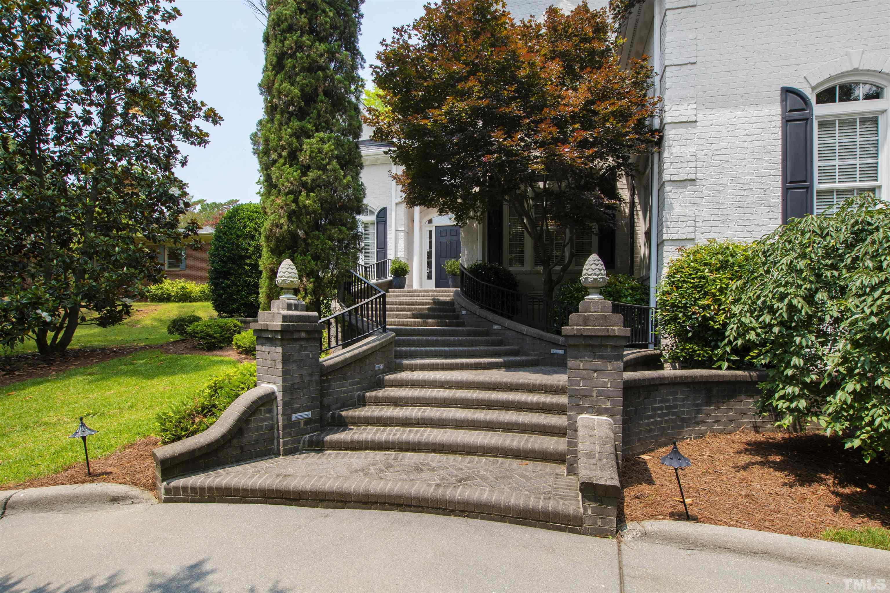 306 Lake Boone Trail Raleigh, NC 27608 - Photo 5 of 55 a view of a garden with patio